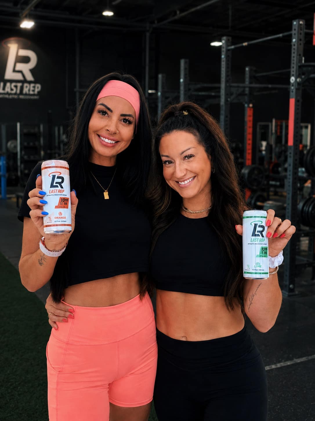 Two athletes with Last Rep Orange and Lime at the gym